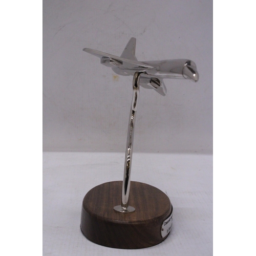 291 - A CHROME CONCORDE ON A WOODEN BASE, HEIGHT 18CM