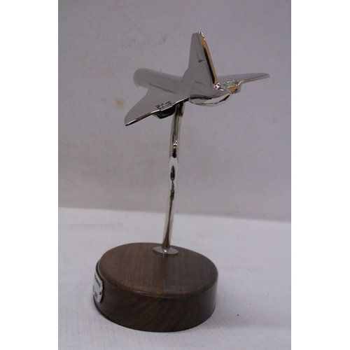 291 - A CHROME CONCORDE ON A WOODEN BASE, HEIGHT 18CM