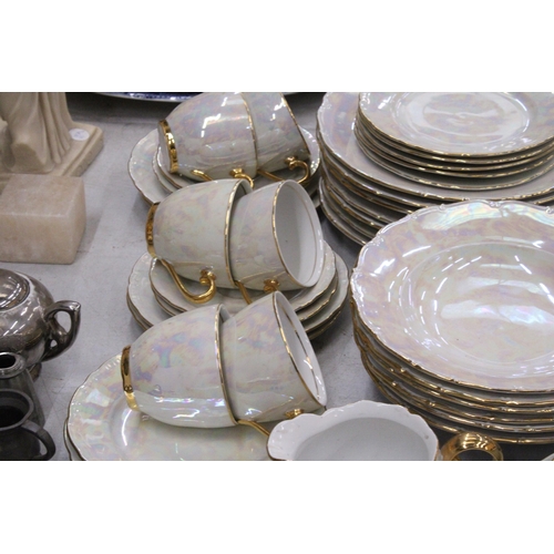 293 - A LUSTREWARE DINNER SERVICE (APPROX 44 PIECES) TO INCLUDE SERVING TUREENS, A SERVING BOWL AND PLATE,... 