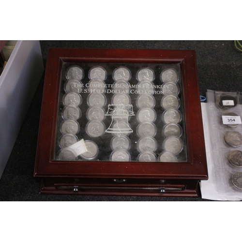 353 - THE CASED COLLECTION OF THIRTY FOUR USA BENJAMIN FRANKLIN HALF DOLLARS