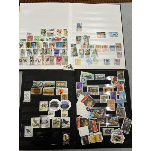 393 - A TWO VOLUME COLLECTION OF NEW ZEALAND MINT AND USED STAMPS