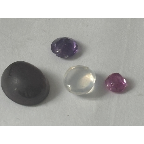 716 - A QUANTITY OF GEMSTONES TO INCLUDE RUBY, TOURMALINE, AMETHYST, TOPAZ ETC TOTAL WEIGHT 11.5 CARATS. T... 