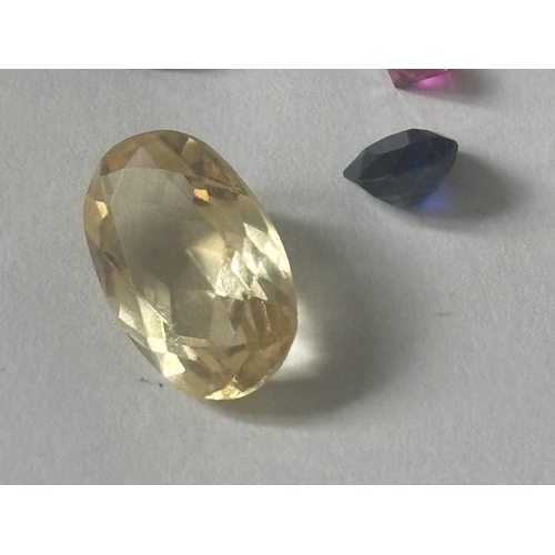 717 - A QUANTITY OF GEMSTONES TO INCLUDE CITRINE, AMETHYST, SAPPHIRE, EMERALD, GARNET, RUBY ETC TOTAL WEIG... 