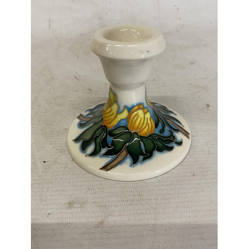 807 - A MOORCROFT CANDLESTICK WINTER ACONITE PATTERN