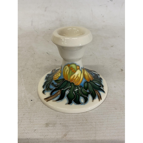 807 - A MOORCROFT CANDLESTICK WINTER ACONITE PATTERN