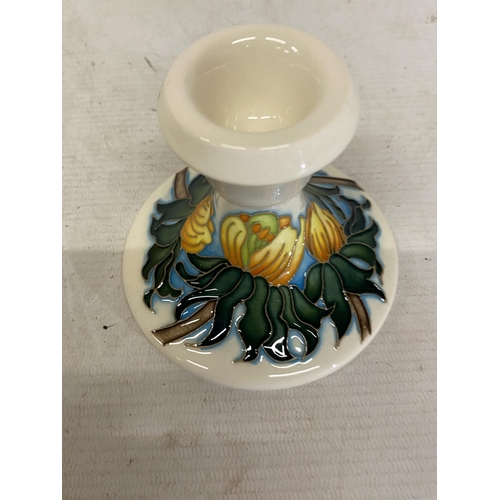 807 - A MOORCROFT CANDLESTICK WINTER ACONITE PATTERN