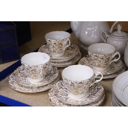 856 - A COLLECTION OF CHINA PLATES, SIDE PLATES, BOWLS, A TEA POT, COFFEE POT, CREAM JUG, SUGAR BOWL, CUPS... 