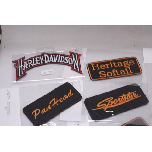 892 - A QUANTITY OF SEW ON BADGES TO INCLUDE HARLEY DAVIDSON, PAN HEAD, HERITAGE SOFTAIL, ETC.,