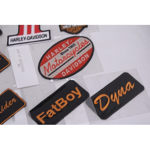 892 - A QUANTITY OF SEW ON BADGES TO INCLUDE HARLEY DAVIDSON, PAN HEAD, HERITAGE SOFTAIL, ETC.,