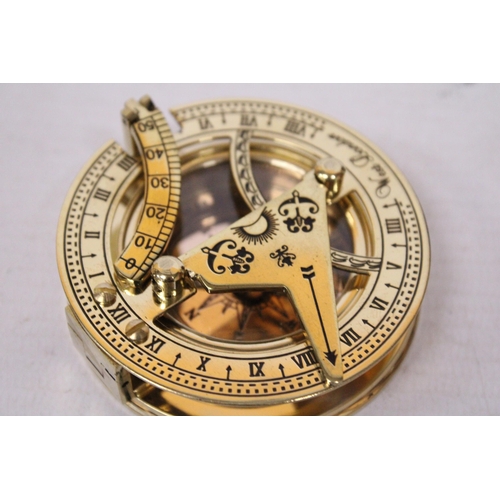 919 - A BOXED BRASS SUNDIAL COMPASS