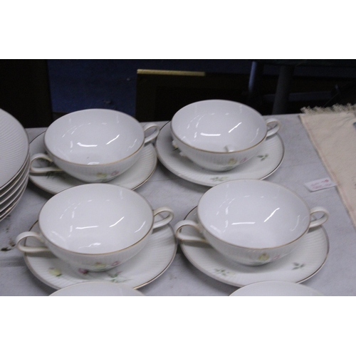 1042 - A QUANTITY OF DINNER WARE TO INCLUDE PLATES, SOUP COUPES AND SAUCERS PLUS GRINDLEY, ROYAL SWAN AND C... 