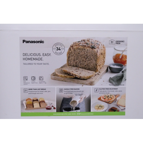 1061 - AN AS NEW PANASONIC AUTOMATIC BREAD MAKER, MODEL NO. SD-B2510, WITH INSTRUCTIONS AND A BREAD COOKERY... 