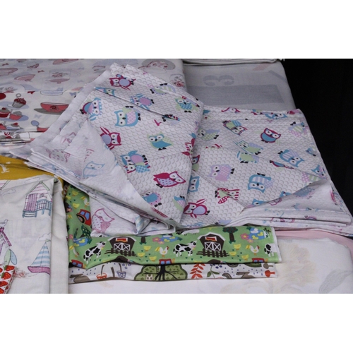 1204 - A LARGE QUANTITY OF OFF CUT AND LARGER PIECES OF PATTERNED FABRIC, PATTERNS FLORAL, ANIMALS, STRIPES... 