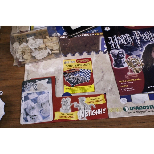 1206 - A COLLECTION OF HARRY POTTER CHESS ITEMS TO INCLUDE CHESS BOARD AND PIECES (NOT COMPLETE)