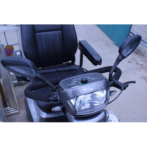 1650A - A STERLING S425 SHOP RIDER MOBILITY SCOOTER COMPLETE WITH CHARGER, KEY, MANUAL AND COVER BELIEVED IN... 