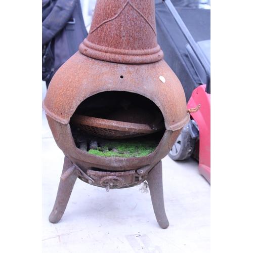 1783 - A SMALL CAST IRON GARDEN CHIMENEA