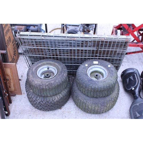 2131 - A SET OF FOUR RIDE ON LAWN MOWER WHEELS AND TYRES