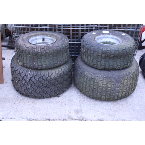 2131 - A SET OF FOUR RIDE ON LAWN MOWER WHEELS AND TYRES