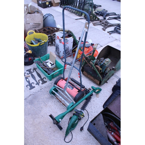 2138 - A PUSH ALONG LAWN MOWER, AN AIR RATOR AND AN ELECTRIC HEDGE TRIMMER AND STRIMMER