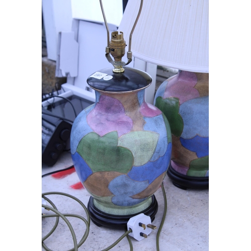 2387 - A PAIR OF DECORATIVE COLOURED CERAMIC TABLE LAMPS