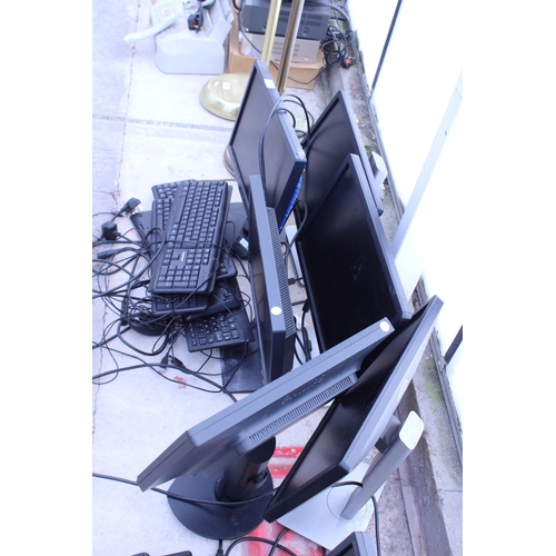 2409 - A LARGE QUANTITY OF COMPUTER MONITORS AND KEYBOARDS ETC