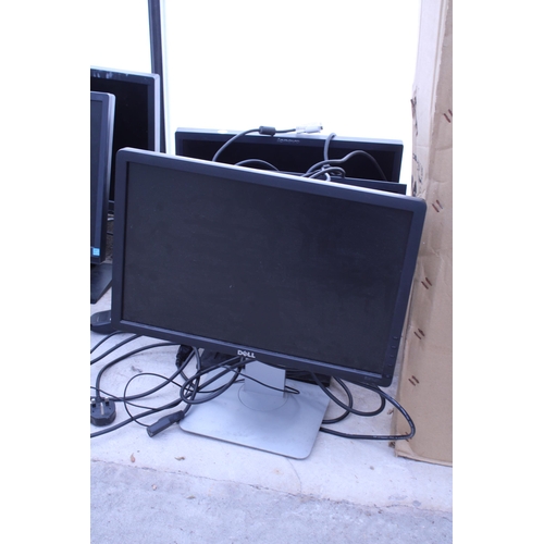 2410 - A LARGE QUANTITY OF COMPUTER MONITORS AND KEYBOARDS ETC