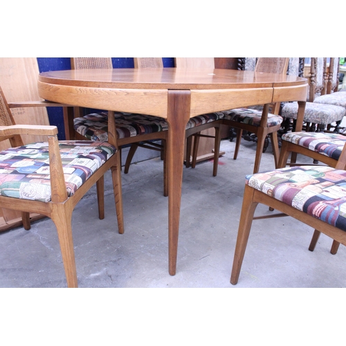 2502 - A RETRO TEAK EXTENDING DINING TABLE 58