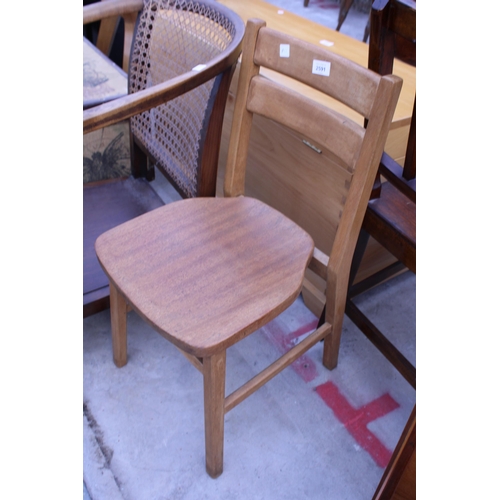 2591 - A TEAK CHILDS DINING CHAIR, SMALL STOOL AND BEECH FRAMED CANE BACK LOUNGE CHAIR