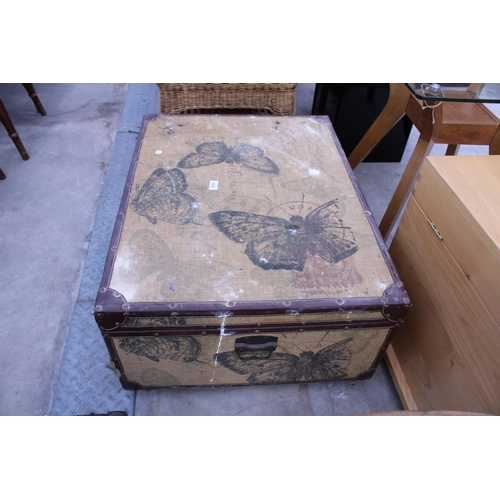 2592 - A STORAGE TRUNK WITH BUTTERLY DECORATION