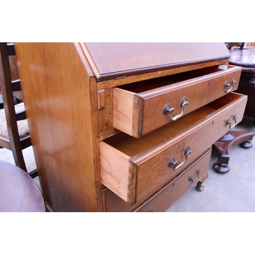 2609 - A MID 20TH CENTURY OAK BUREAU ON CABRIOLE LEGS BEARING NORTHAMPTON CABINET COMPANY, 30