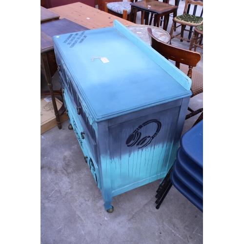 2661 - A MID 20TH CENTURY PAINTED CHEST OF THREE DRAWERS WITH BANKSY STYLE DECORATION, 36