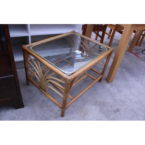 2687 - A BAMBOO AND WICKER OCCASIONAL TABLE WITH GLASS TOP, 26