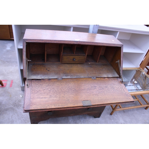 2688 - A MID 20TH CENTURY OAK BUREAU, 34