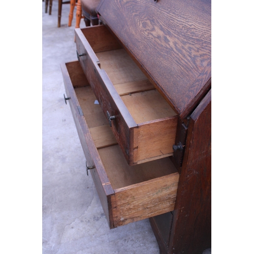 2688 - A MID 20TH CENTURY OAK BUREAU, 34