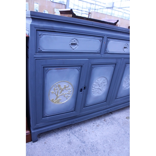 2699 - AN ORIENTAL HARDWOOD PAINTED SIDEBOARD WITH THREE FRIEZE DRAWERS AND FOUR CUPBOARDS WITH CARVED PANE... 