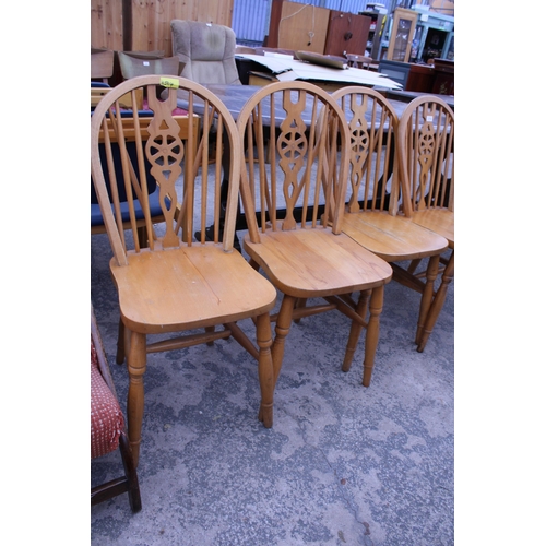 2778 - A SET OF FOUR WHEEL-BACK DINING CHAIRS