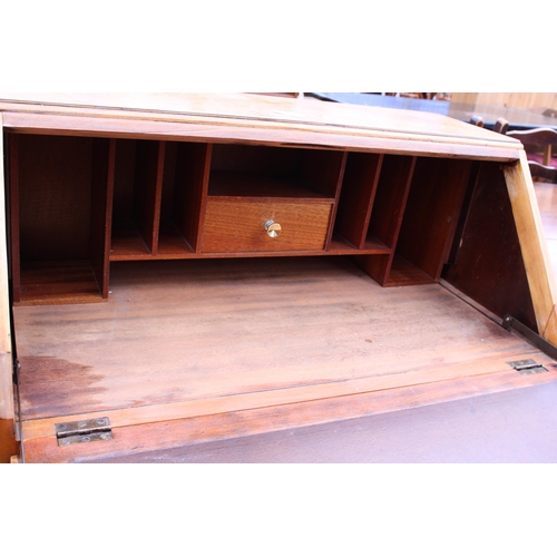 2781 - A MID 20TH CENTURY OAK BUREAU, 30