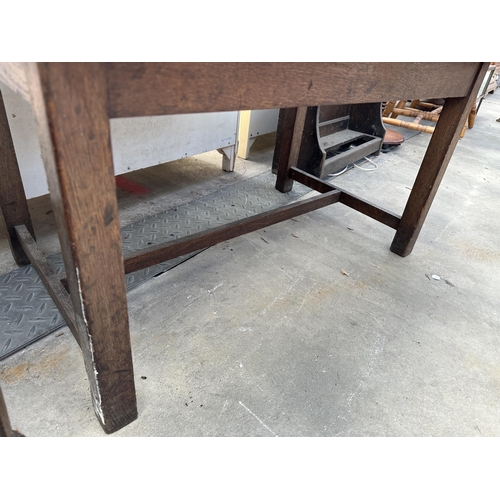 2822 - AN EARLY 20TH CENTURY OAK COFFEE TABLE AND VICTORIAN OAK DINING CHAIR