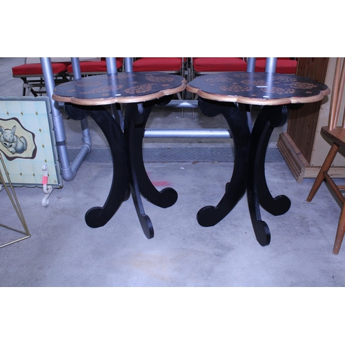 2900 - A PAIR OF BLACK PAINTED OCCASIONAL TABLES WITH GOLD PAINTED TRIM AND PATTERNED TOP, 21