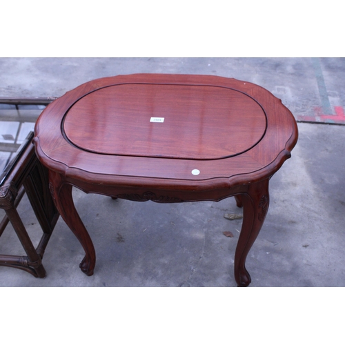 2909 - AN OVAL HARDWOOD COFFEE TABLE AND BAMBOO AND WICKER GLASS TOP COFFEE TABLE