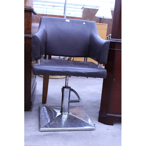 2957 - A BROWN FAUX LEATHER PUMP ACTION SALON CHAIR ON CHROME BASE