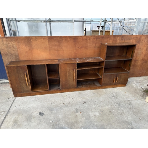 3020 - A RANGE OF THREE MID 20TH CENTURY OAK STORAGE SHELVES ENCLOSING CUPBOARDS, TWO SECTIONS BEING 40.5