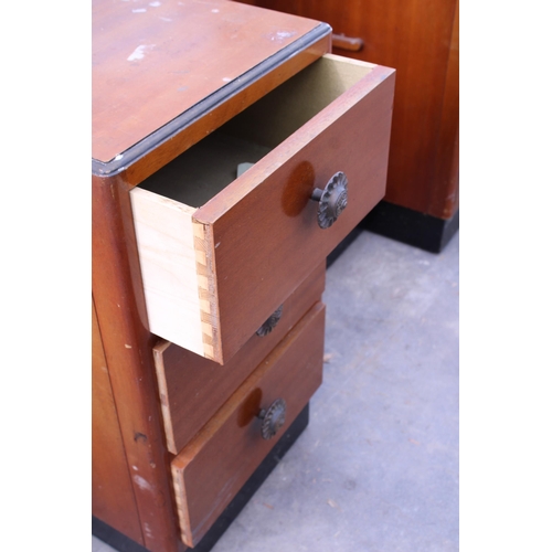 3030 - AN ART DECO STYLE PEDESTAL DRESSING TABLE WITH SIX DRAWERS AND A LARGE ROUND MIRROR