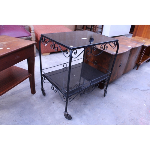 3033 - A WROUGHT IRON FRAMED TWO TIER TABLE WITH GLASS TOPS AND COFFEE TABLE