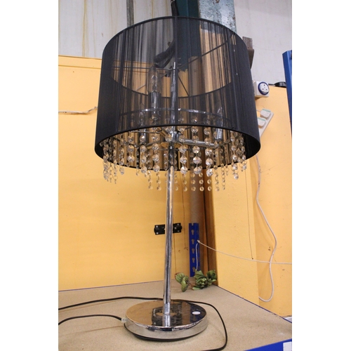 299 - A LARGE TABLE LAMP WITH THREE BULBS AND MESH SHADE WITH CRYSTALS, HEIGHT APPROX 70CM