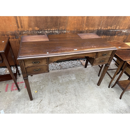 2523 - AN EDWARDIAN STYLE TWIN-PEDESTAL WRITING TABLE ENCLOSING FOUR DRAWERS, 46