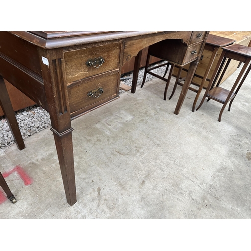 2523 - AN EDWARDIAN STYLE TWIN-PEDESTAL WRITING TABLE ENCLOSING FOUR DRAWERS, 46