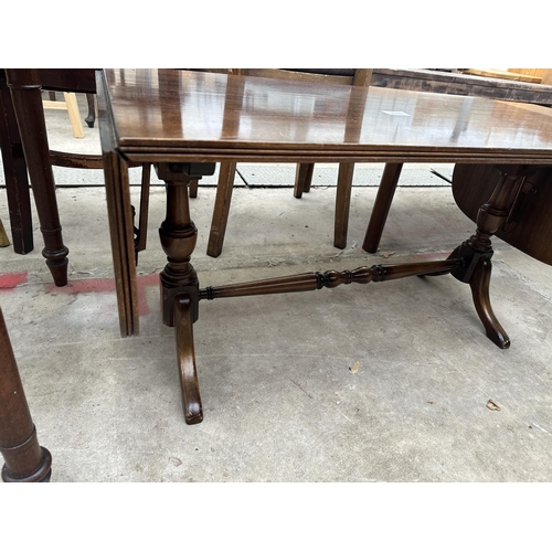 2549 - A MAHOGANY TWIN-PEDESTAL DROP-LEAF COFFEE TABLE