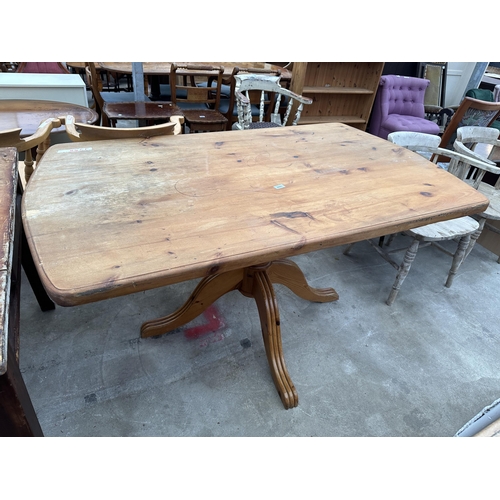 2643 - A PINE PEDESTAL DINING TABLE, 60