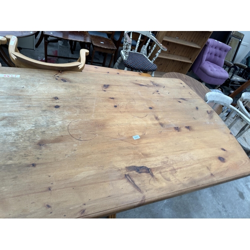 2643 - A PINE PEDESTAL DINING TABLE, 60